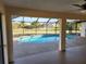 Covered patio overlooking the pool area at 25484 Terrain Ln, Punta Gorda, FL 33983