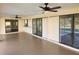 Large covered patio with multiple ceiling fans at 25484 Terrain Ln, Punta Gorda, FL 33983