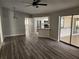 Living room with an open floor plan and pool access at 25484 Terrain Ln, Punta Gorda, FL 33983