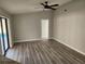 Bright and airy living room featuring hardwood floors at 25484 Terrain Ln, Punta Gorda, FL 33983