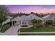 Aerial view of house at sunset with landscaping at 4611 Shark Dr, Bradenton, FL 34208