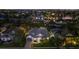 Night view of a luxury home in a desirable neighborhood at 4611 Shark Dr, Bradenton, FL 34208