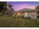 Charming home with a landscaped backyard, patio, and pool at 4611 Shark Dr, Bradenton, FL 34208