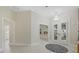 Bright and airy foyer with high ceilings and neutral colors at 4611 Shark Dr, Bradenton, FL 34208