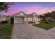 Stunning curb appeal, featuring a paver driveway and attractive facade at 4611 Shark Dr, Bradenton, FL 34208