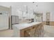 Modern kitchen featuring white cabinetry, quartz countertops, and stainless steel appliances at 4611 Shark Dr, Bradenton, FL 34208