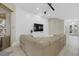 Living room with sectional sofa and shiplap accent wall at 4611 Shark Dr, Bradenton, FL 34208