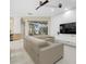 Spacious living room with sectional sofa and view of the pool and canal at 4611 Shark Dr, Bradenton, FL 34208