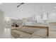 Open concept living room with sectional sofa and view of kitchen at 4611 Shark Dr, Bradenton, FL 34208
