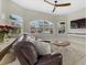 Spacious living area with a comfortable seating arrangement and large windows at 4611 Shark Dr, Bradenton, FL 34208
