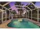 Enclosed pool and spa area with brick pavers at 4611 Shark Dr, Bradenton, FL 34208