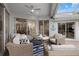 Covered patio with comfortable seating overlooking the pool and kitchen at 4611 Shark Dr, Bradenton, FL 34208