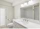 Bathroom features a mirror, drawers, a shower, and toilet at 482 Rubens Dr E, Nokomis, FL 34275