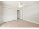 Bedroom featuring a ceiling fan and closet at 482 Rubens Dr E, Nokomis, FL 34275