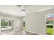 Relaxing bedroom with sliding door access to pool area and large windows providing bright light at 482 Rubens Dr E, Nokomis, FL 34275