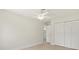 Bedroom featuring a ceiling fan, closet, and view to the bathroom at 482 Rubens Dr E, Nokomis, FL 34275