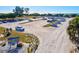 Spacious sandy parking lot at North Jetty Park, close to the beach and other amenities at 482 Rubens Dr E, Nokomis, FL 34275