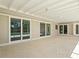 Covered patio with brick floor and access to the pool at 482 Rubens Dr E, Nokomis, FL 34275
