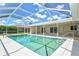 A screened-in pool offers a relaxing escape and adds value to this beautiful home at 482 Rubens Dr E, Nokomis, FL 34275