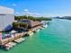 Inviting waterfront restaurant featuring outdoor dining, boat docks, and fun activities for all at 482 Rubens Dr E, Nokomis, FL 34275