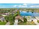 Aerial view of a lovely single-Gathering home with lush landscaping and lake views at 5307 52Nd W Ave, Bradenton, FL 34210