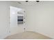 Bedroom leading to an open-concept floor plan with modern cabinetry at 5307 52Nd W Ave, Bradenton, FL 34210