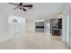 Open concept living area with neutral walls, a chandelier, and stylish cabinetry at 5307 52Nd W Ave, Bradenton, FL 34210