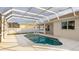 Inviting private pool in a screened-in lanai, perfect for outdoor entertaining and relaxation at 5307 52Nd W Ave, Bradenton, FL 34210