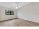 A bright bedroom with neutral walls and updated flooring at 5535 Hampstead Heath # 45, Sarasota, FL 34235