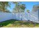 White vinyl fence and gate enclosure in backyard at 5611 26Th W St, Bradenton, FL 34207