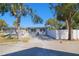 Home exterior showcasing a side view and a white fence at 5611 26Th W St, Bradenton, FL 34207