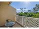 Private balcony overlooking lush greenery and palm trees at 6101 34Th W St # 19H, Bradenton, FL 34210