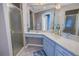 Bathroom features a corner vanity and walk-in shower at 6101 34Th W St # 19H, Bradenton, FL 34210