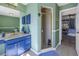 Bathroom with shower, vanity, and a view into the bedroom at 6101 34Th W St # 19H, Bradenton, FL 34210