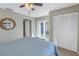 Comfortable bedroom with sliding door access to a patio at 6101 34Th W St # 19H, Bradenton, FL 34210