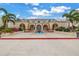 Building exterior with fountain and landscaping at 6101 34Th W St # 19H, Bradenton, FL 34210
