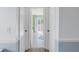 Hallway with access to bathroom and bedroom at 6101 34Th W St # 19H, Bradenton, FL 34210