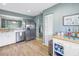 Modern kitchen with white cabinets and stainless steel appliances at 6101 34Th W St # 19H, Bradenton, FL 34210