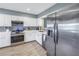 Modern kitchen with stainless steel appliances at 6101 34Th W St # 19H, Bradenton, FL 34210