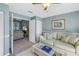 Light and airy living room with a sofa and access to another room at 6101 34Th W St # 19H, Bradenton, FL 34210