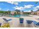 Community pool with plenty of lounge chairs for relaxing at 6101 34Th W St # 19H, Bradenton, FL 34210
