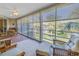 Spacious sunroom, featuring ample natural light and patio access at 6101 34Th W St # 19H, Bradenton, FL 34210