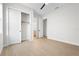 An open, light-filled bedroom with walk-in closet and view to ensuite bathroom offers relaxation at 8328 Sea Glass Ct, Sarasota, FL 34240