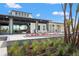 Stylish clubhouse patio with comfortable seating, landscaping, and an inviting atmosphere for relaxing and socializing at 8328 Sea Glass Ct, Sarasota, FL 34240