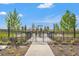 Enclosed dog park with secure fencing, benches, and landscaping provides a safe space for pets to socialize at 8328 Sea Glass Ct, Sarasota, FL 34240