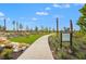 Scenic fitness course with exercise stations, winding paths, and lush landscaping promotes an active lifestyle at 8328 Sea Glass Ct, Sarasota, FL 34240