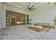 Beautifully decorated lanai with stylish outdoor seating and open access to the home's interior at 8328 Sea Glass Ct, Sarasota, FL 34240