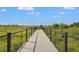 Scenic nature boardwalk offering picturesque views and a serene escape into the natural surroundings at 8328 Sea Glass Ct, Sarasota, FL 34240