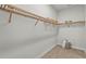 Spacious walk-in closet with built-in shelving and ample storage, ideal for organization and convenience at 8328 Sea Glass Ct, Sarasota, FL 34240