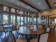 Clubhouse dining area with tables and chairs at 8752 Bellussi Dr, Sarasota, FL 34238